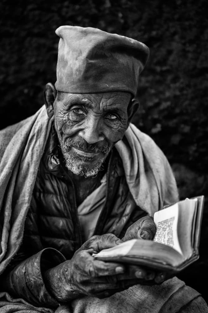 Elderly Monk Reading by Trevor Cole — canvas wall art