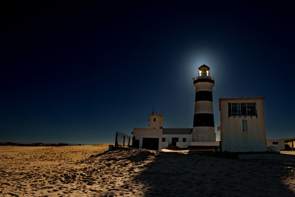 Desert Lighthouse Glow by Etienne Steenkamp — canvas wall art