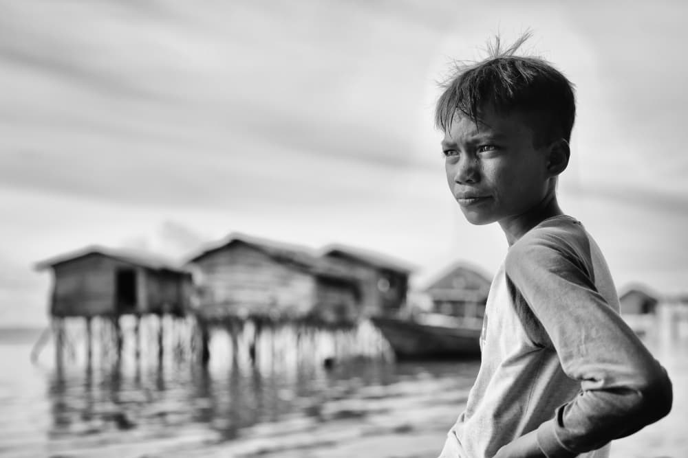 Thoughtful Village Boy by Kieron Long — canvas wall art