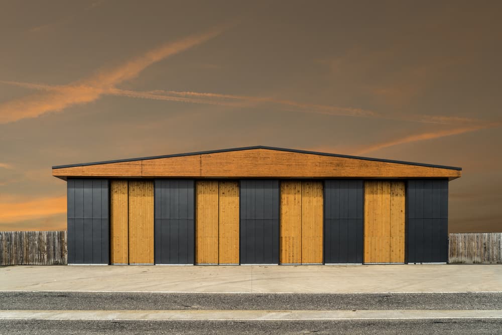 Modern Building Sunset by Luc Vangindertael (laGrange) — canvas wall art