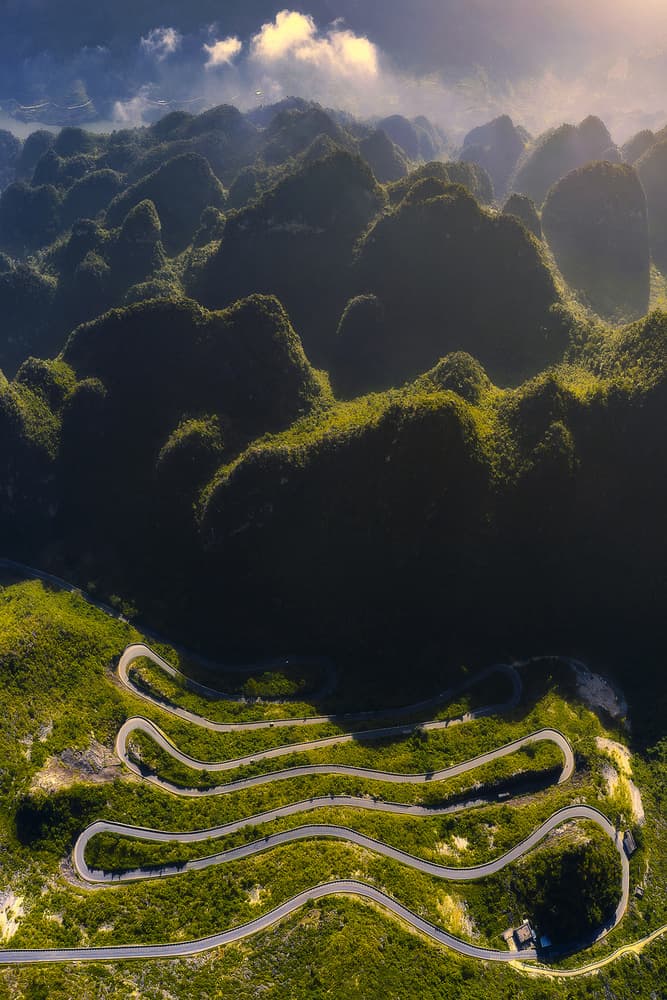 Winding Mountain Road View by TIANQI — canvas wall art