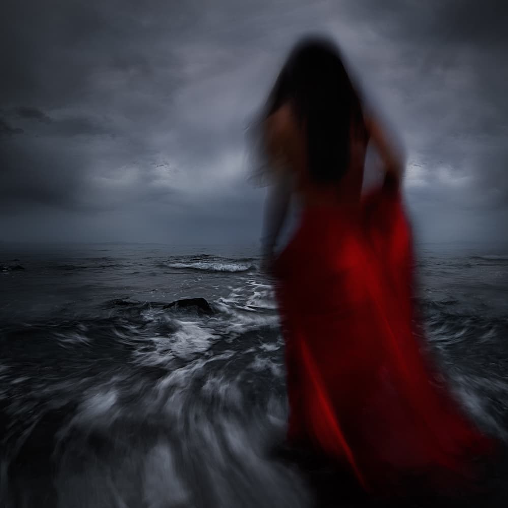 Red Dress Stormy Sea by Maria Kaimaki — canvas wall art