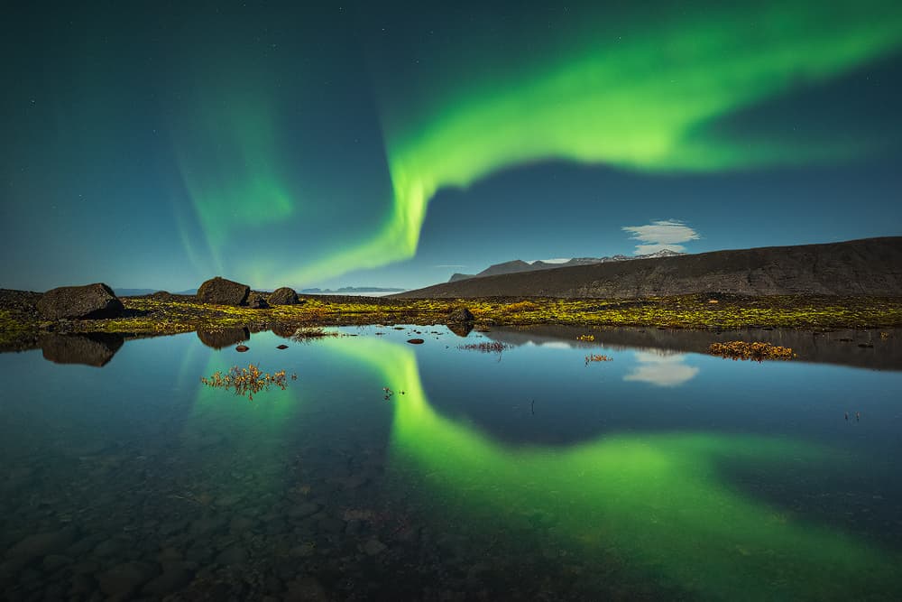 Vibrant Aurora Reflection by Raymond Hoffmann — canvas wall art