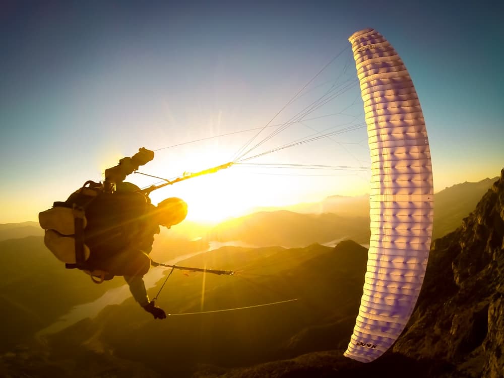 Epic Paragliding Sunset by Tristan Shu — canvas wall art
