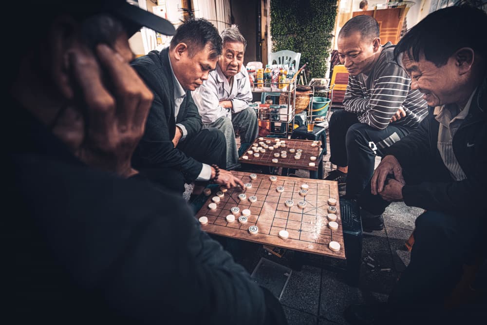 Street Chess Players by Marco Tagliarino — canvas wall art