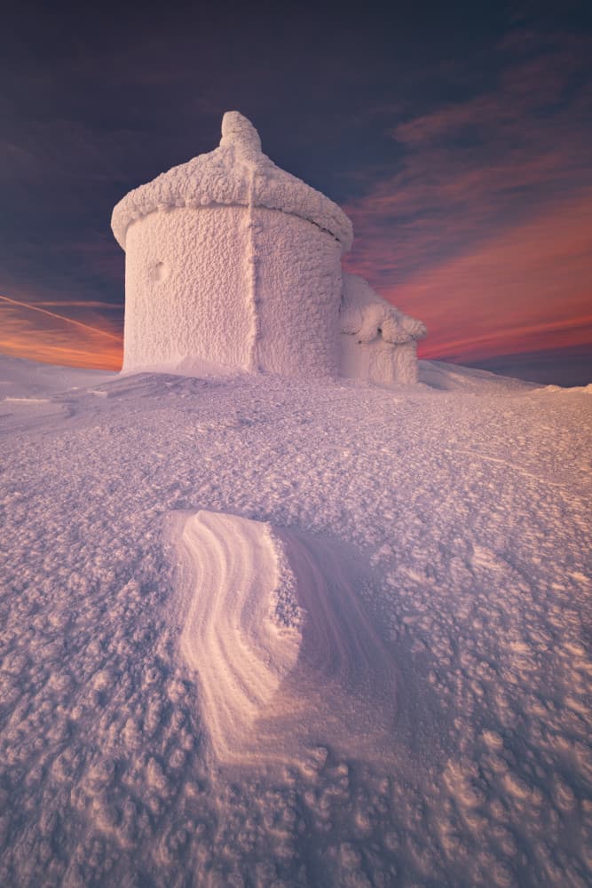 Frozen Mountain Hut Sunset by Karol Nienartowicz — canvas wall art