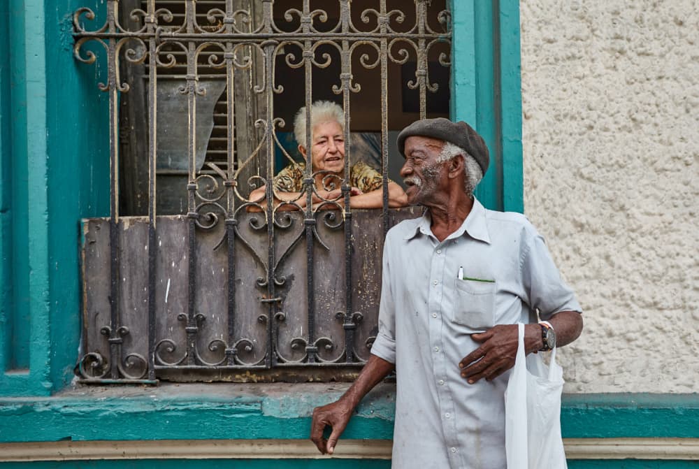 Cuban Window Conversation by Avital Hershkovitz — canvas wall art
