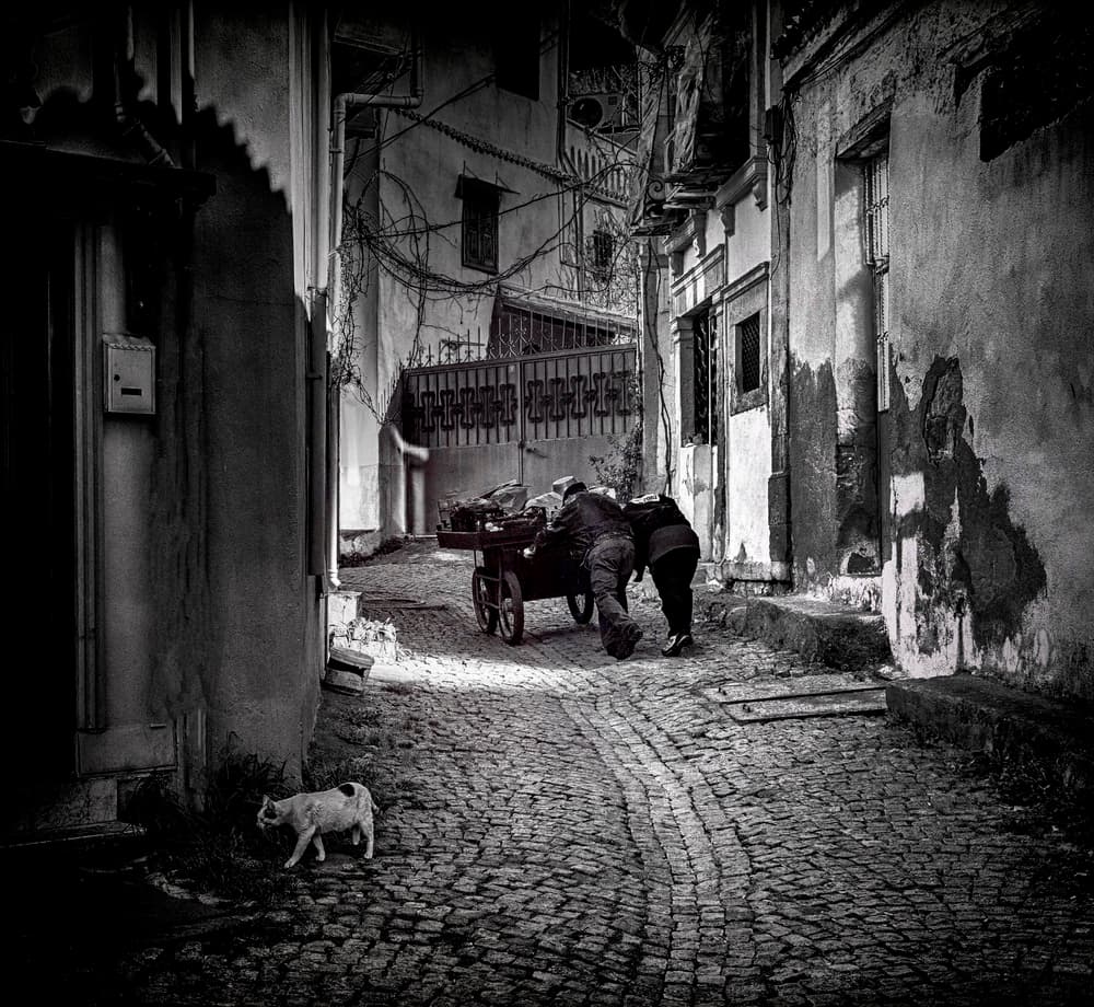 Pushing Cart Old Street by Ömer Ates Kızıltug — canvas wall art