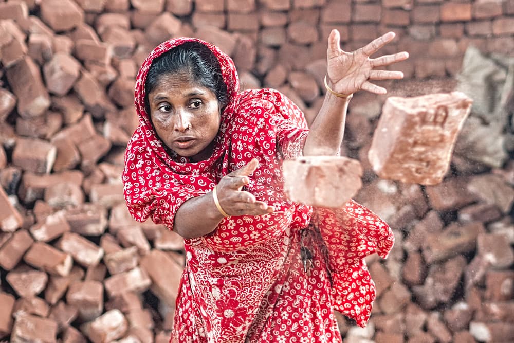Focused Brick Worker by Marcel Rebro — canvas wall art
