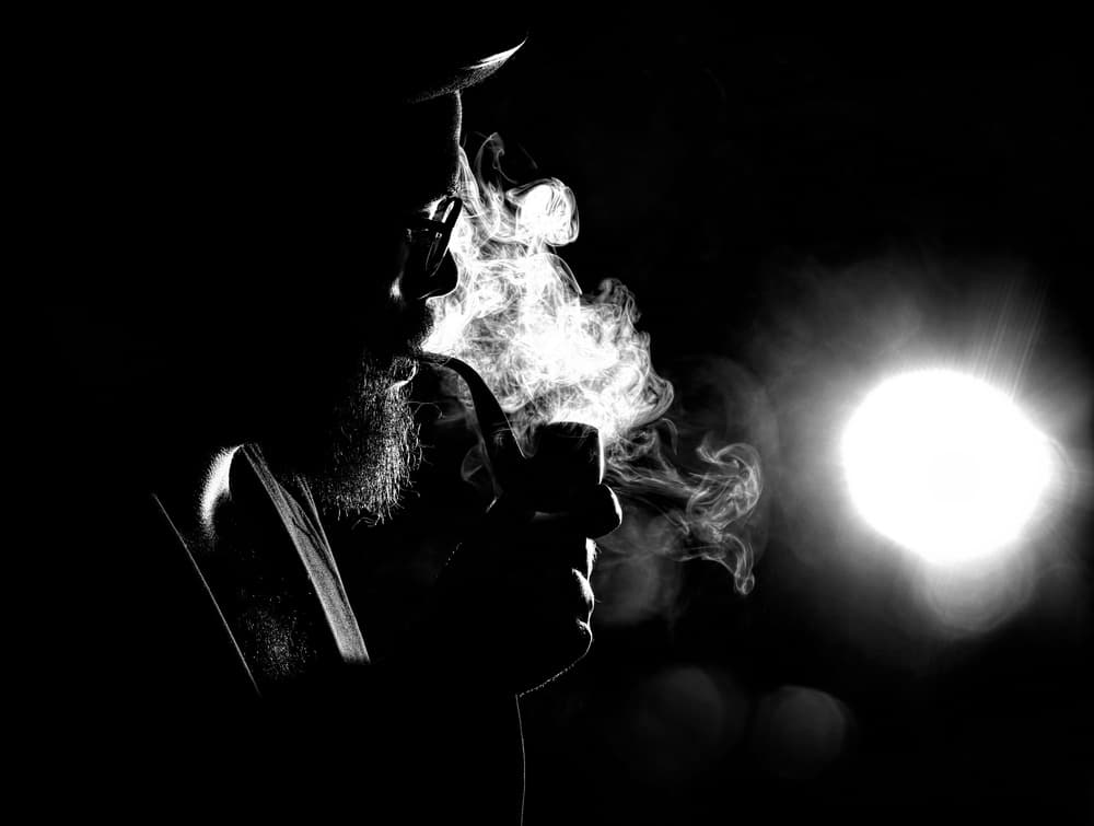 Contemplative Pipe Smoker by Paulo Medeiros — canvas wall art