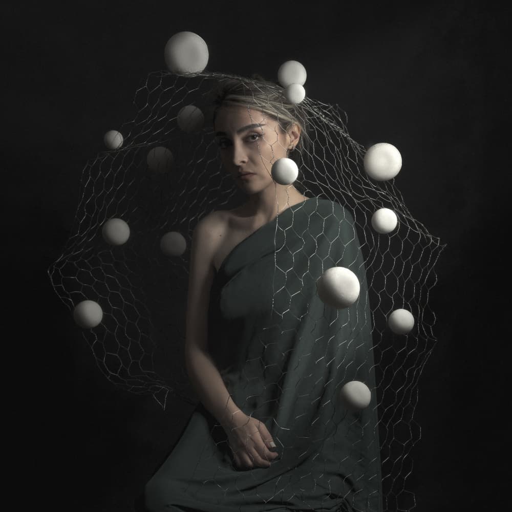 Woman with Wire Net by Hooman Sedaghi — canvas wall art