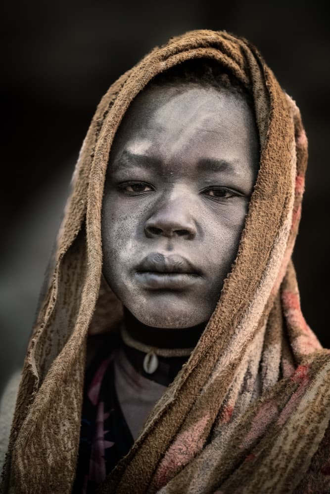 Solemn Tribal Portrait by Trevor Cole — canvas wall art