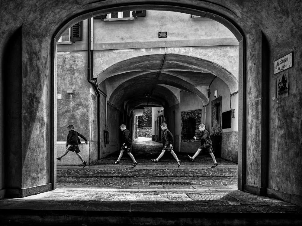 Running Boys Archway by Adam Dauria ☂ — canvas wall art