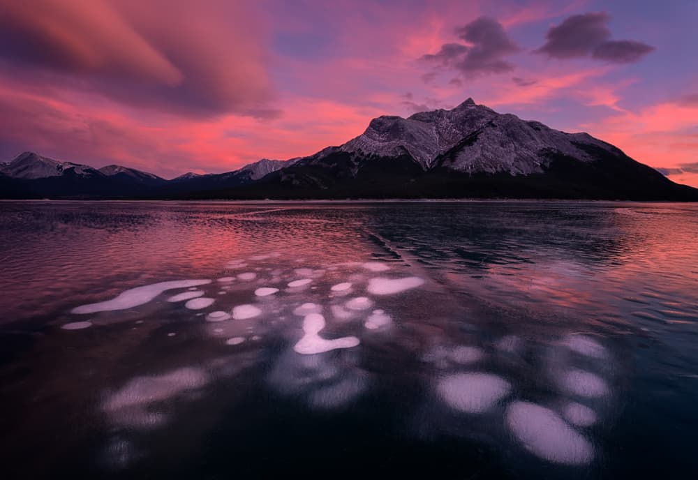 Frozen Lake Mountain Sunset by Lydia Jacobs — canvas wall art