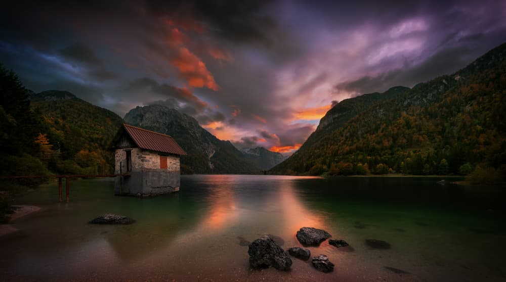 Moody Lake Cabin Sunset by Krzysztof Browko — canvas wall art