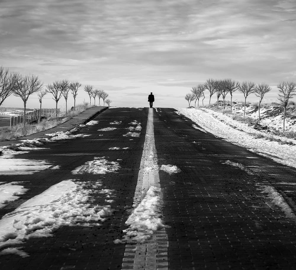 Lone Man Winter Road by Yavuz Pancareken — canvas wall art