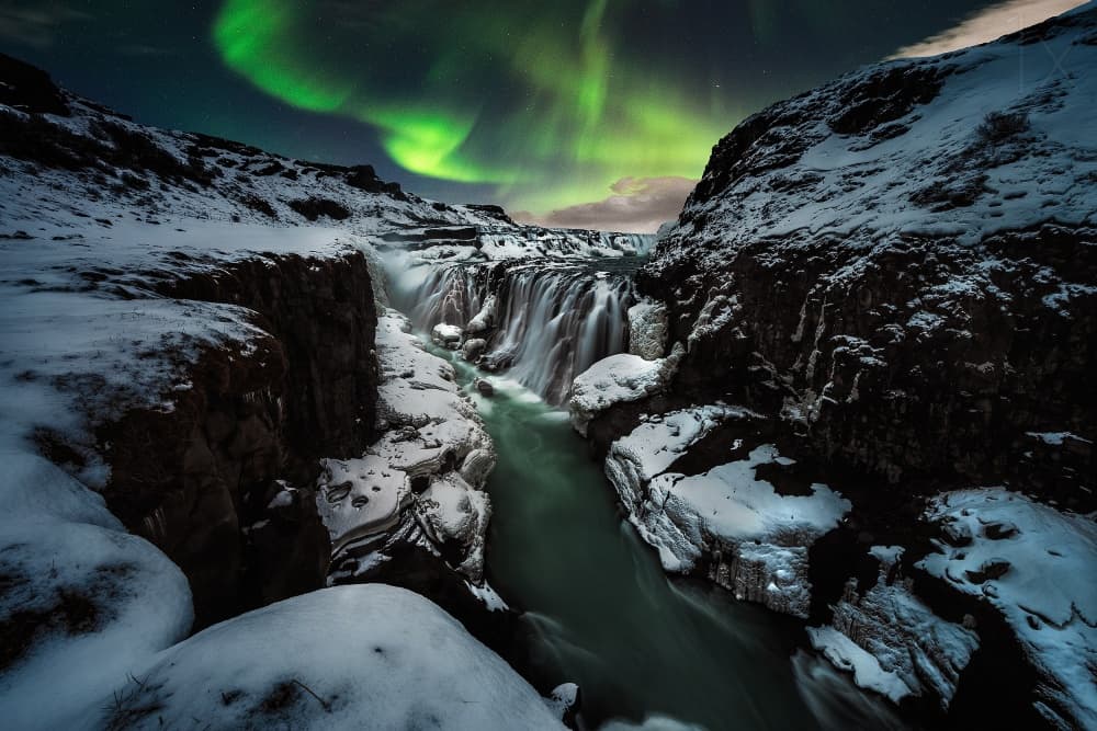 Aurora Winter Waterfall by David Martin Castan — canvas wall art