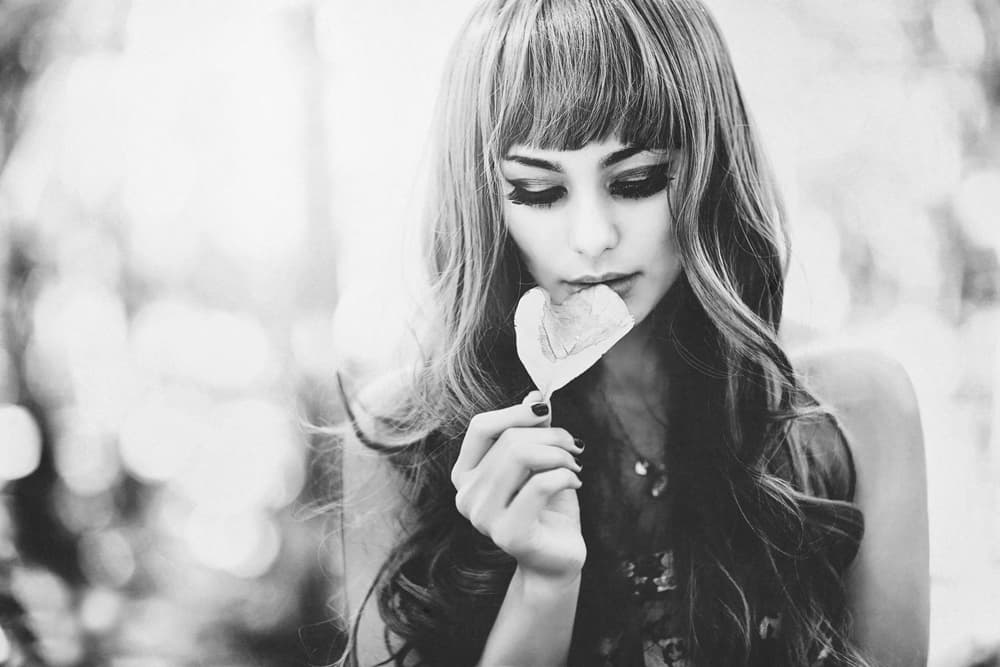 Pensive Beauty Holding Heart by Abr Abe — canvas wall art