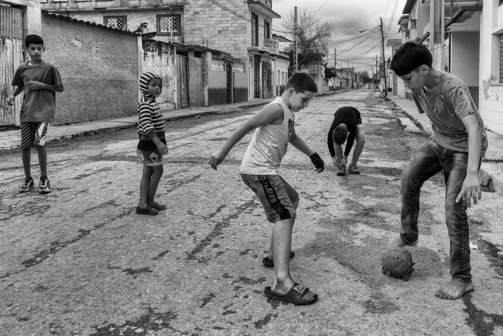 Street Soccer Game by Andy Bauer — canvas wall art