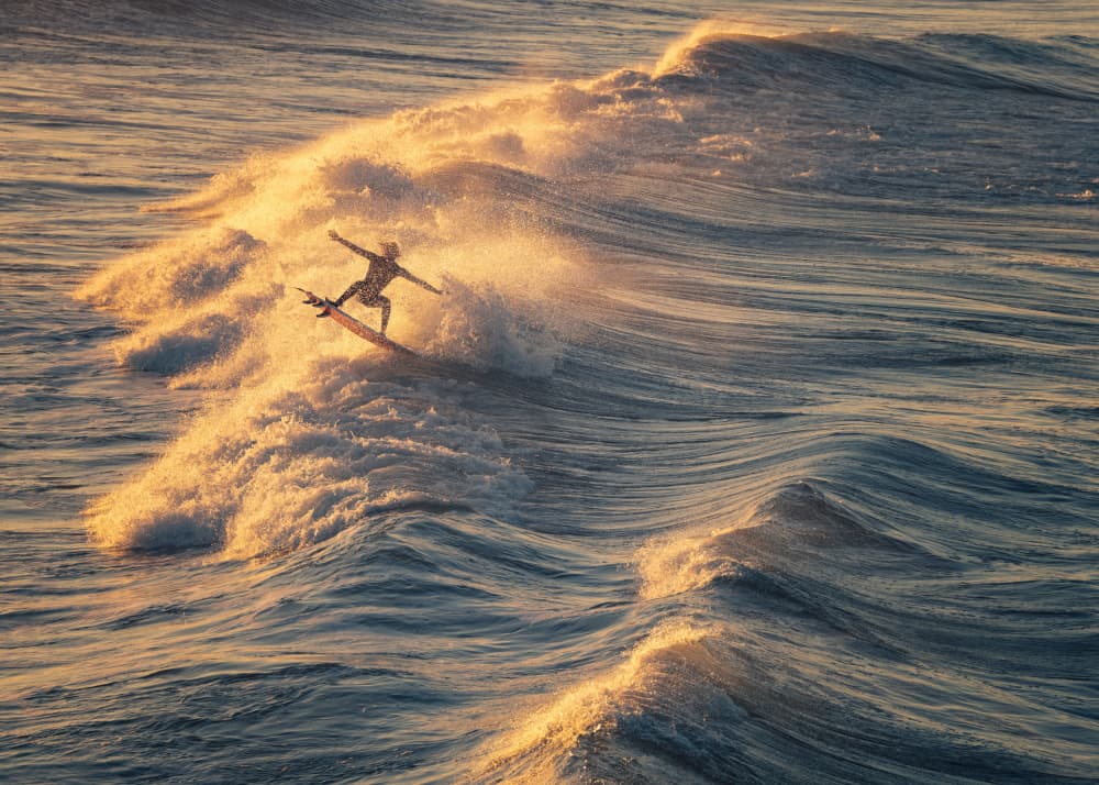 Golden Wave Surfer by Wei Xu — canvas wall art