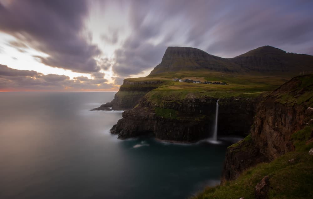 Dramatic Cliffside Waterfall by April Xie — canvas wall art