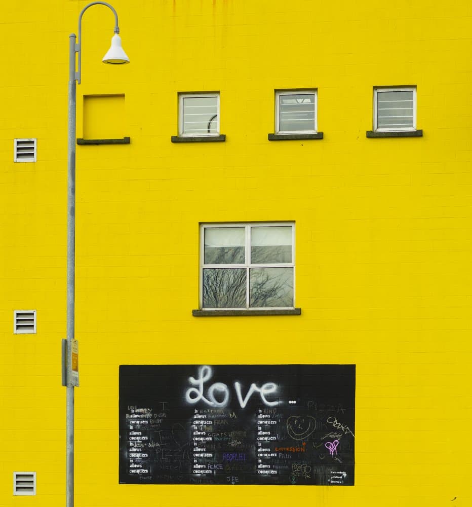 Love On Yellow Wall by James Yang — canvas wall art