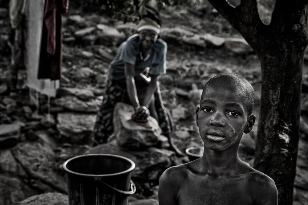 Boy's Candid Gaze by Joxe Inazio Kuesta Garmendia — canvas wall art