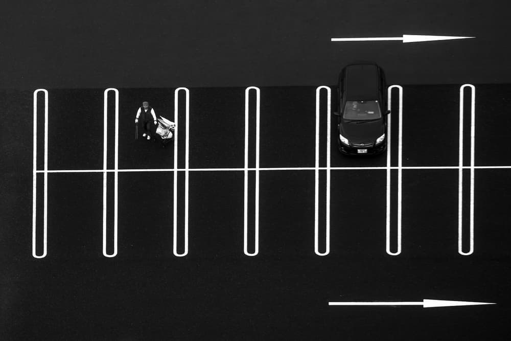 Solitary Figure Parking Lot by Gunarto Song — canvas wall art