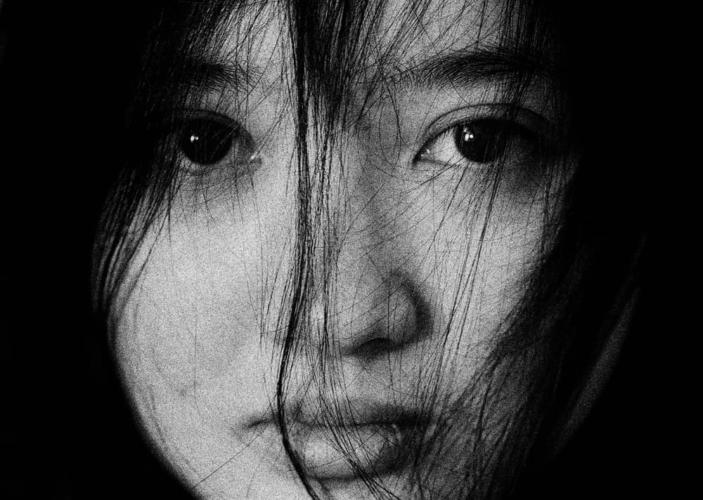 Mysterious Woman's Gaze by Andi Halil — canvas wall art