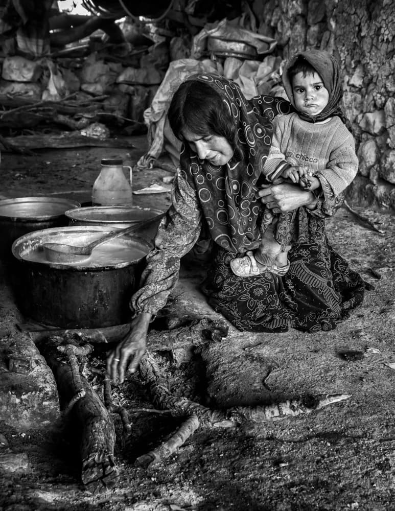 Mother and Child Cooking by Mohammadreza Momeni — canvas wall art