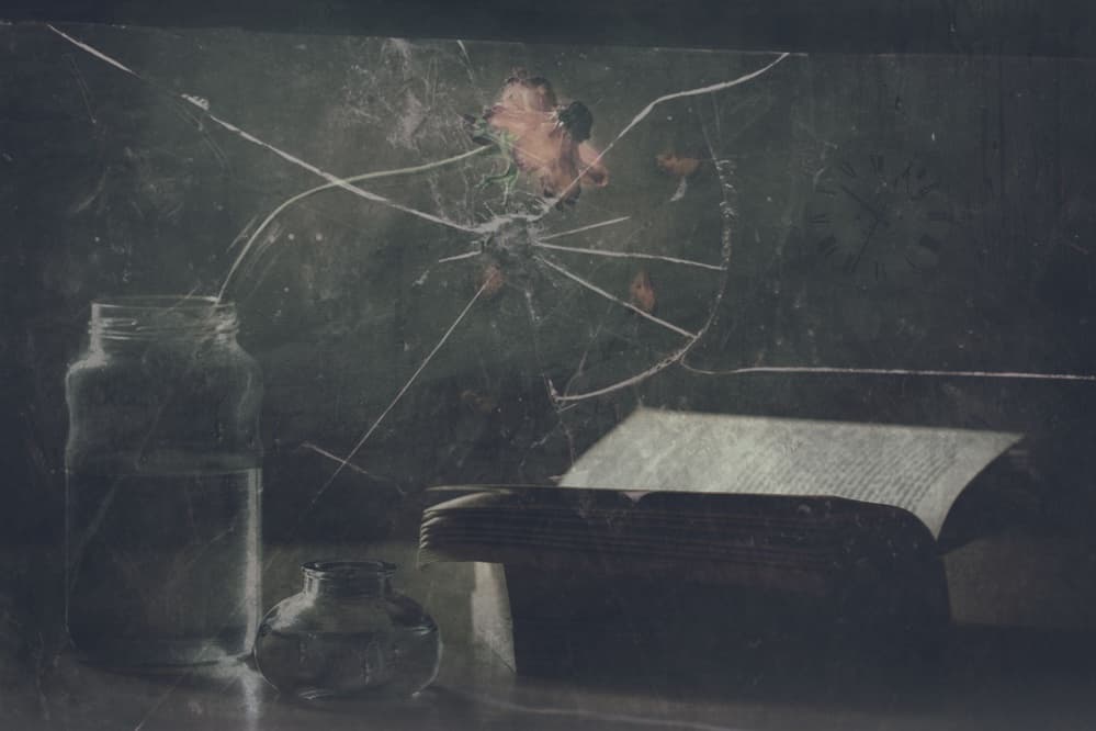 Cracked Glass and Old Book by Delphine Devos — canvas wall art