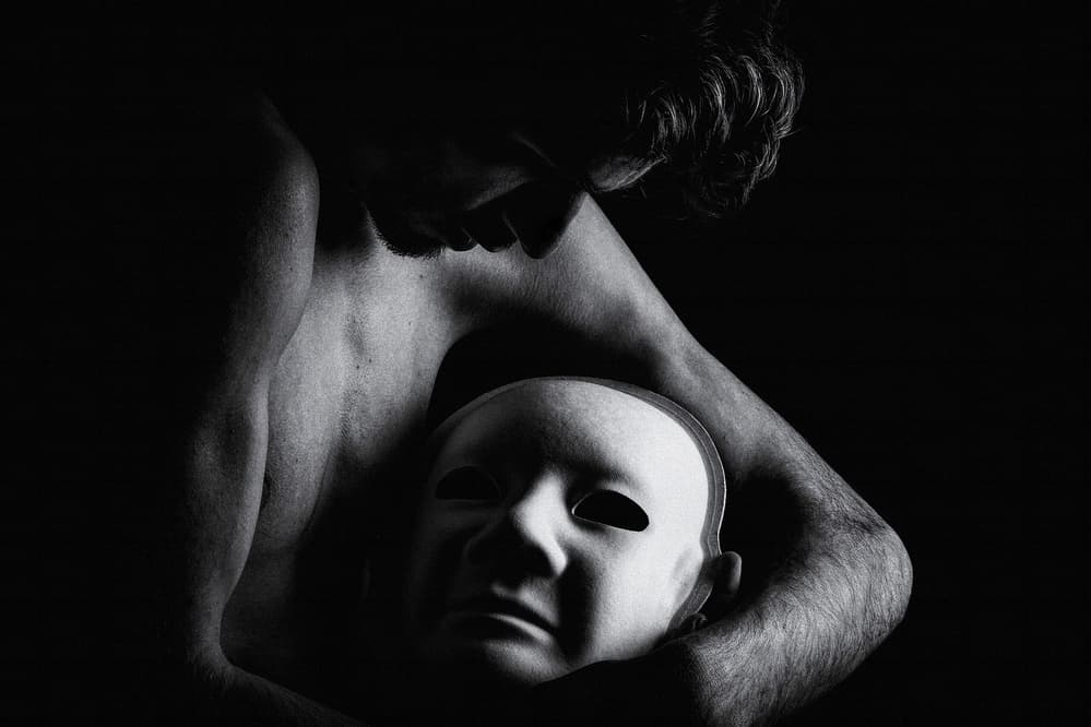 Man Holding Mask by Paulo Medeiros — canvas wall art