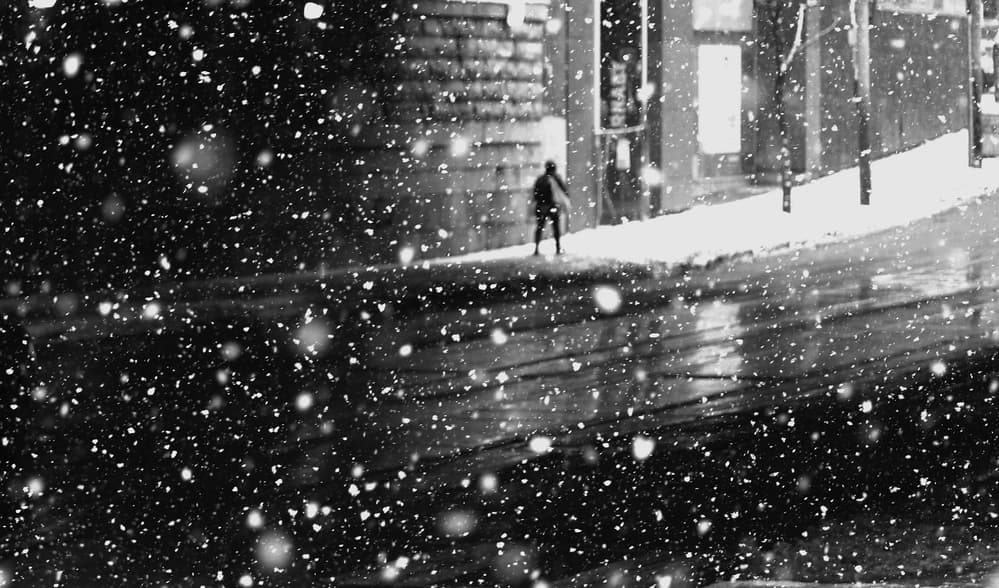 Snowy City Night by Jian Wang — canvas wall art
