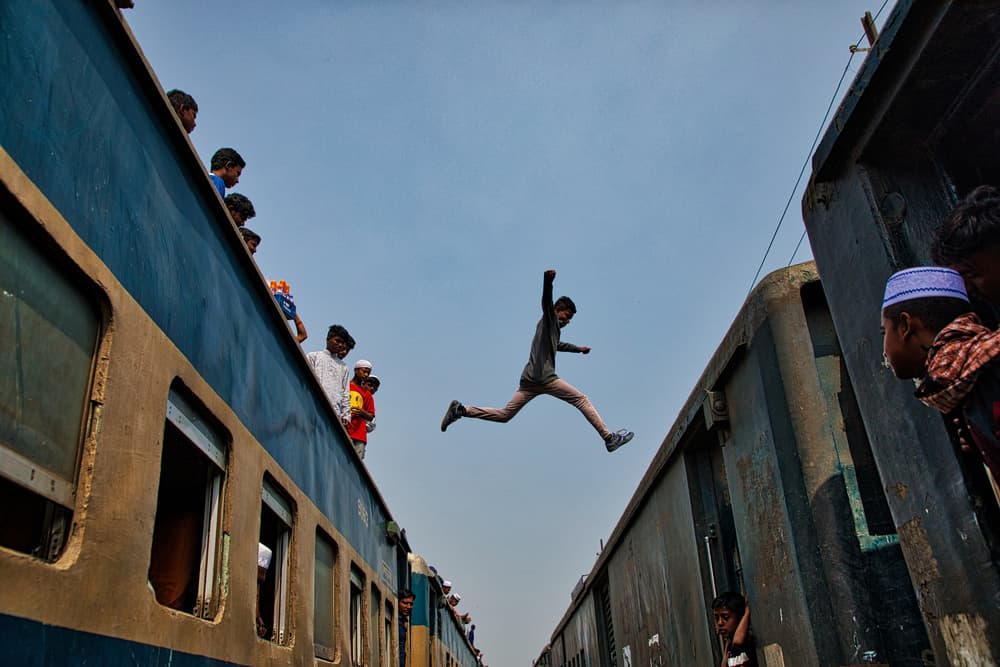Daring Train Jump by Azim Khan Ronnie — canvas wall art