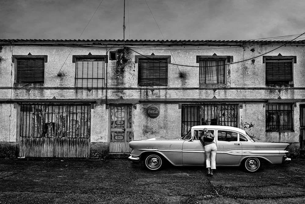 Woman By Classic Car by Jose C. Lobato — canvas wall art