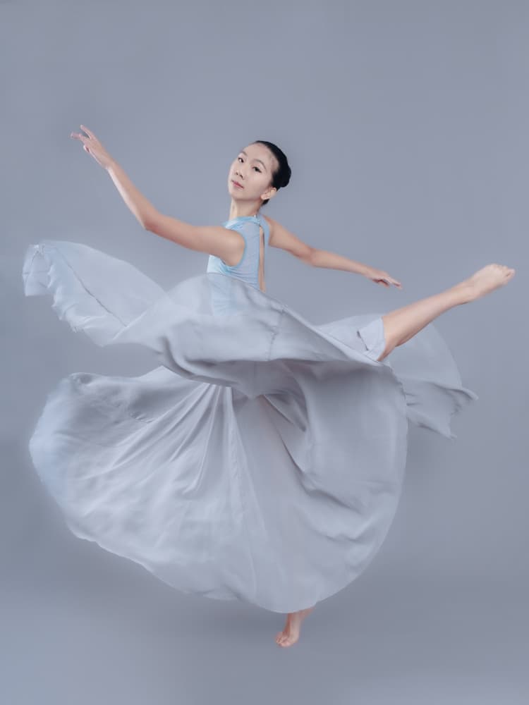 Graceful Dancer Leaping by Jeff Wang — canvas wall art