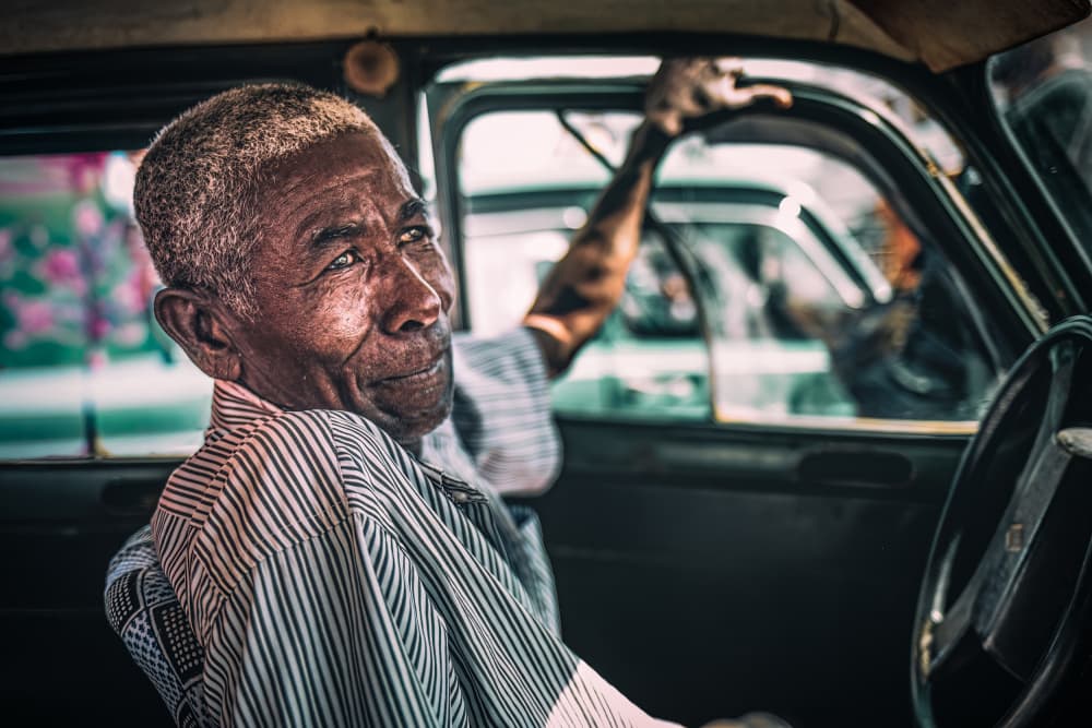 Elderly Man's Smile by Marco Tagliarino — canvas wall art