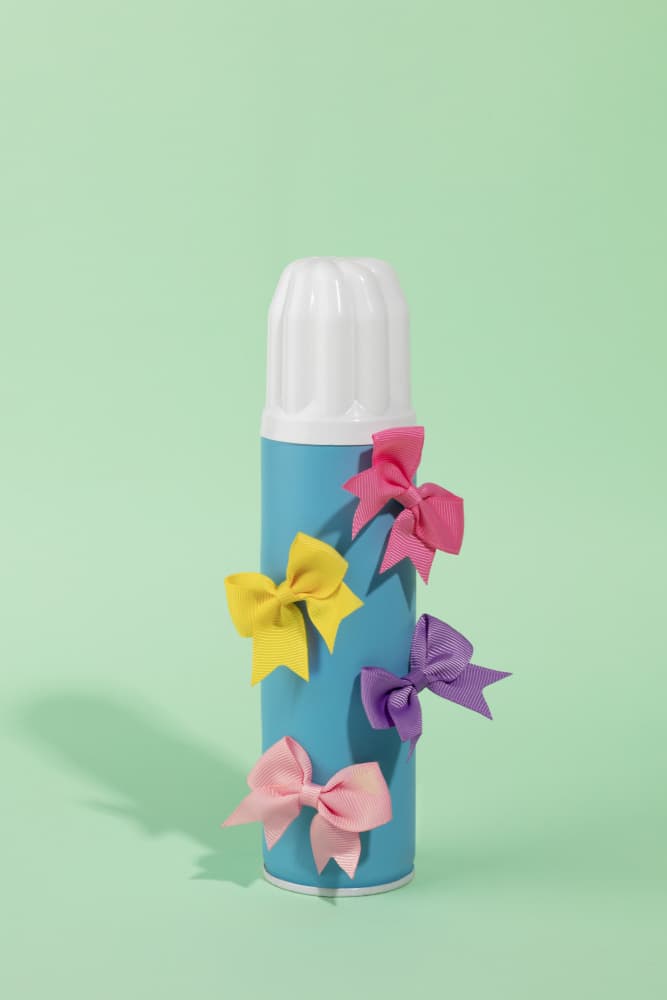 Playful Bows Bottle by Julia Ramiro — canvas wall art