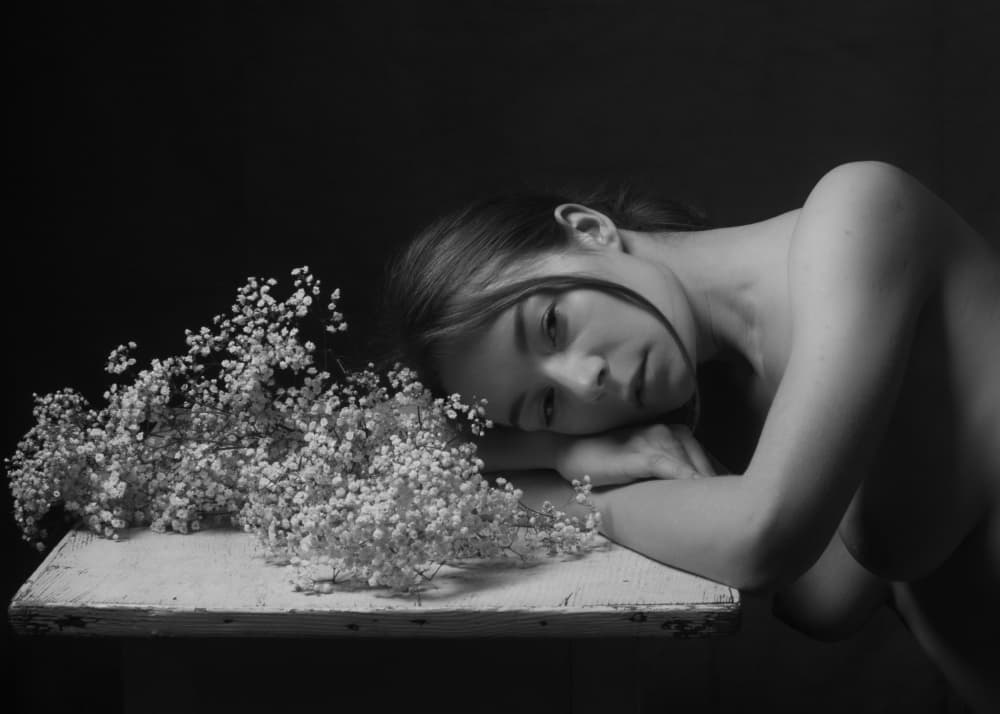 Contemplative Woman with Flowers by Ruth Franke — canvas wall art