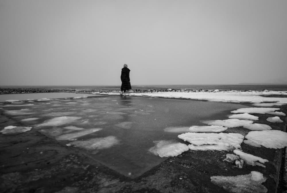 Lone Figure Winter Lake by Mi Young Choi — canvas wall art