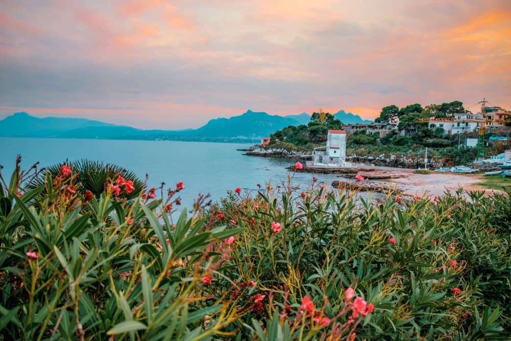 Pink Sunset Coastal Village by Gabor Estefan — canvas wall art