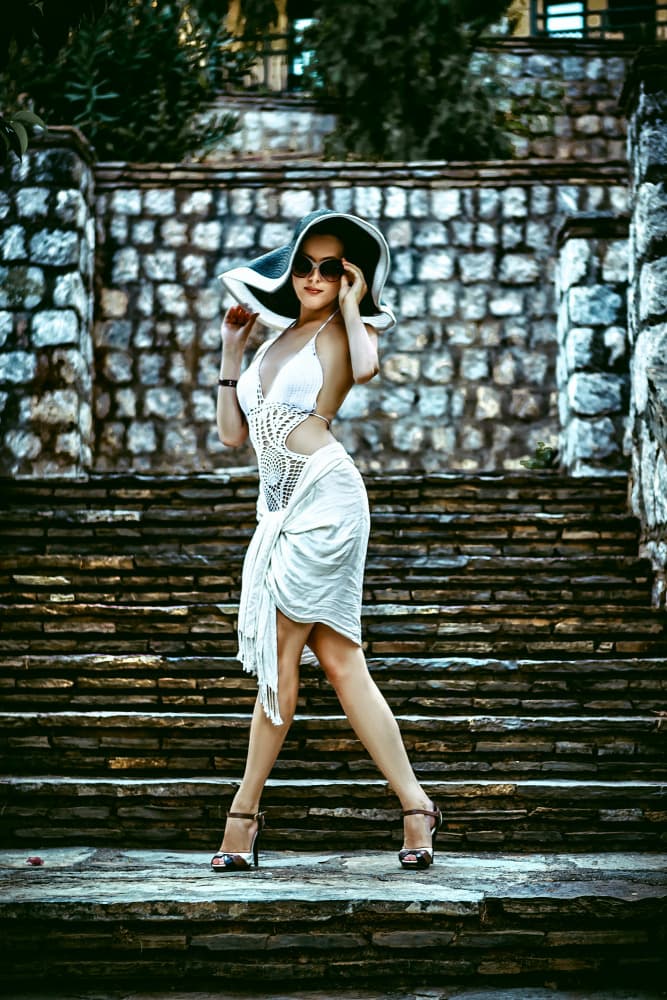Stylish Woman Summer Hat by Ruslan Bolgov — canvas wall art