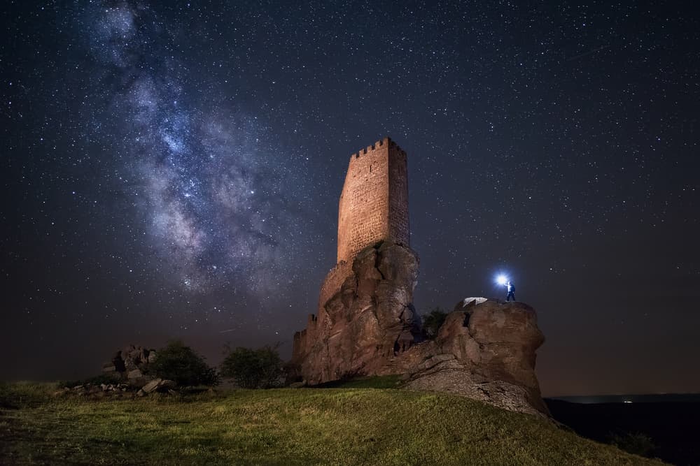 Starlight Over Ancient Tower by Iván Ferrero — canvas wall art