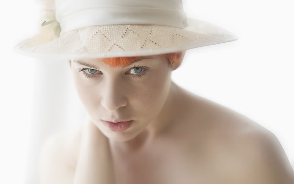 Pensive Woman Hat by kenp — canvas wall art