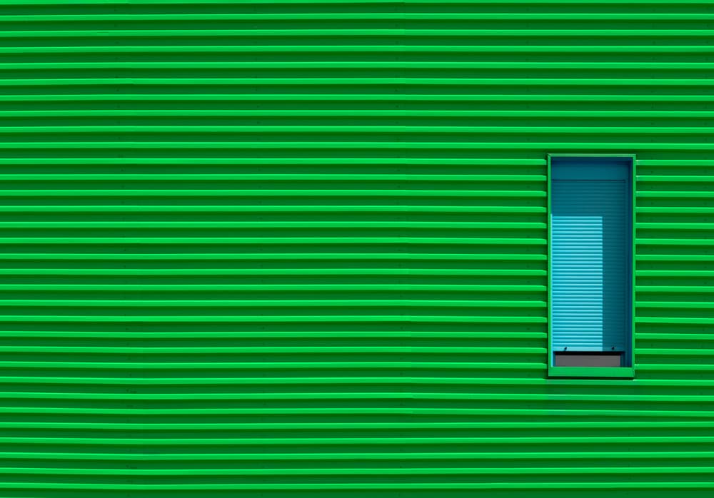 Green Wall Blue Window by Alfonso Novillo — canvas wall art