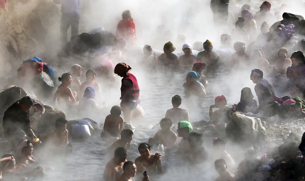 Steamy Hot Spring Bath by Adam Wong — canvas wall art