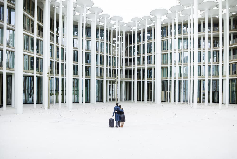 Couple's Architectural Journey by Michael Allmaier — canvas wall art