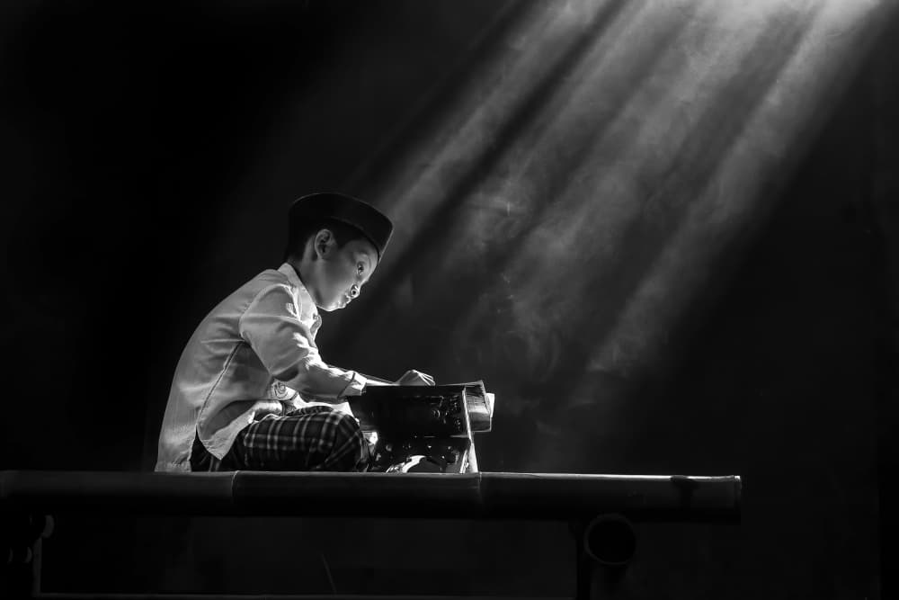 Focused Boy Reading Light by Antonyus Bunjamin (Abe) — canvas wall art