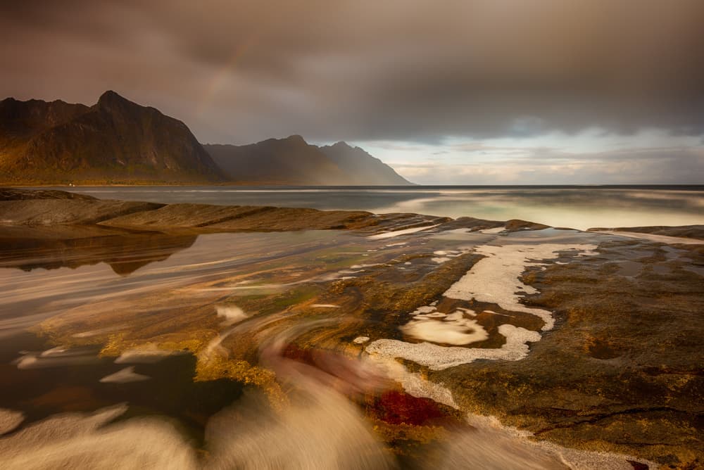 Moody Coastal Rainbow by Piet Haaksma — canvas wall art