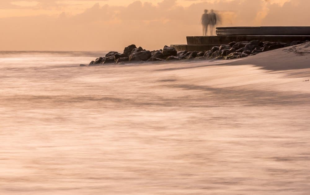Golden Hour Beach Figures by Ugur Erkmen — canvas wall art